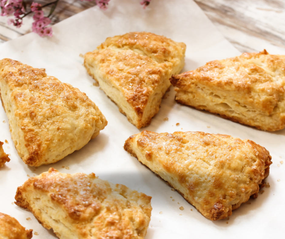 Cook in the air fryer at 350°F for 15 minutes or until the scone is cooked all the way through. Whisk together glaze ingredients, adjusting the amount of cream until desired consistency is reached. Drizzle glaze over scones and allow to set. 